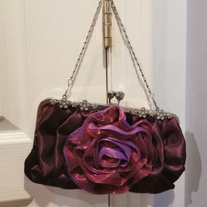 Purple rose flower clutch